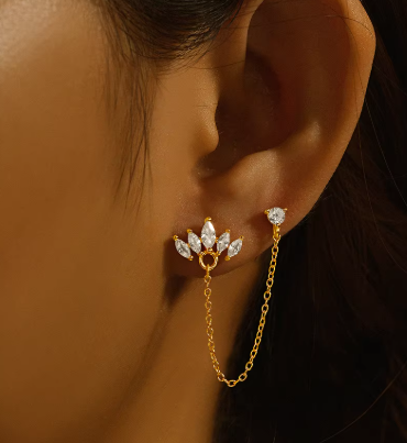 piercing avec chaine en or femme