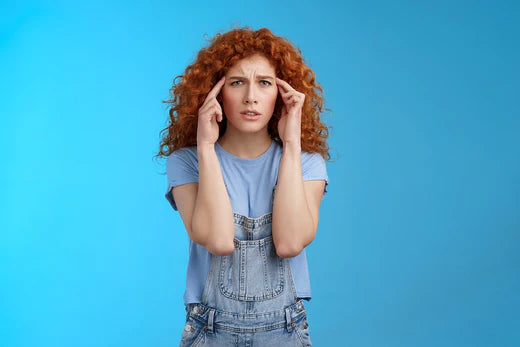 femme souffrant de migraines