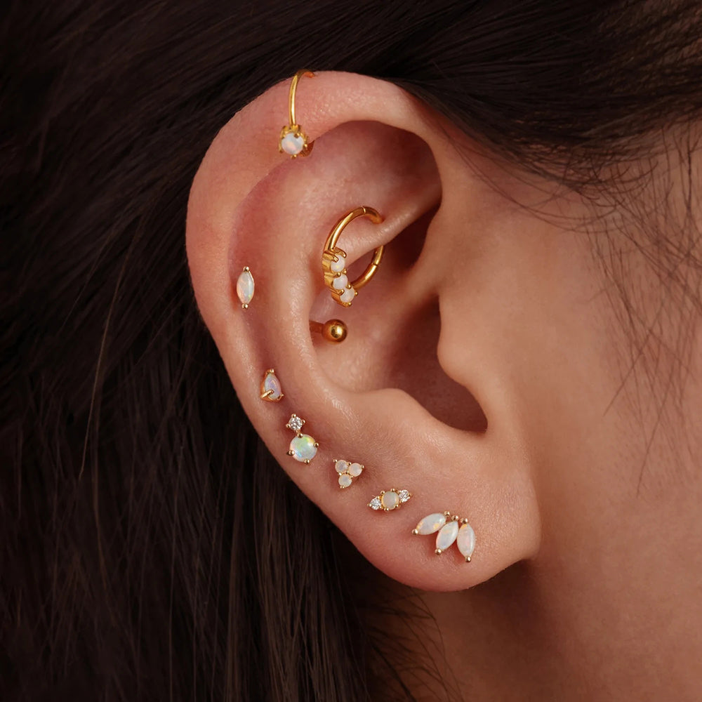 piercing oreja opalo oro mujer