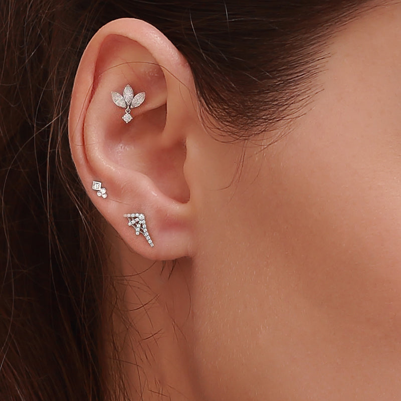 piercing tragus plaqué or femme